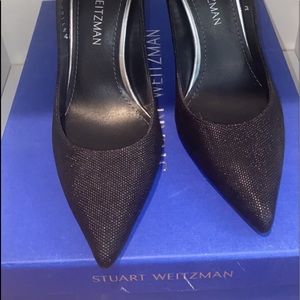 Black pointed toe heels